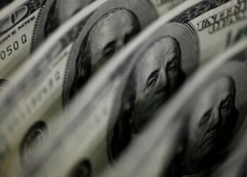 Notas de dólar
02/08/2011 - REUTERS/Yuriko Nakao