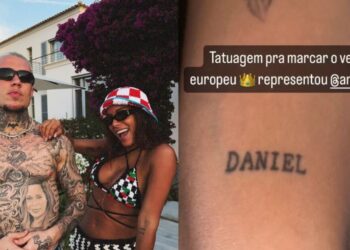 Cantora desmentiu a brincadeira do amigo, revelando que o nome em seu braço é em homenagem a seu sócio, Daniel Trovejani Instagram/MC Daniel/Anitta