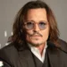 Johnny Depp na coletiva de imprensa de "Jeanne Du Barry" no Festival de Cannes de 2023 • Stephane Cardinale - Corbis/Corbis via Getty Images
