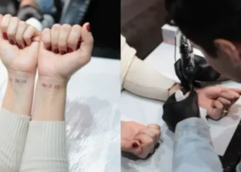 Fiéis realizaram tatuagem coletiva em igreja de Santa Catarina • Reprodução/Redes Sociais